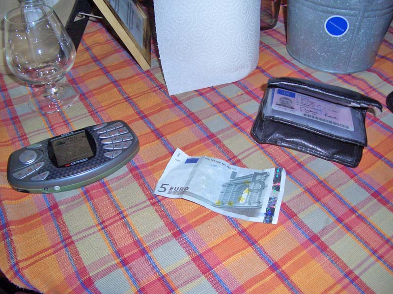 The triple hit note, the device used to enter it, and the storage tool for it.