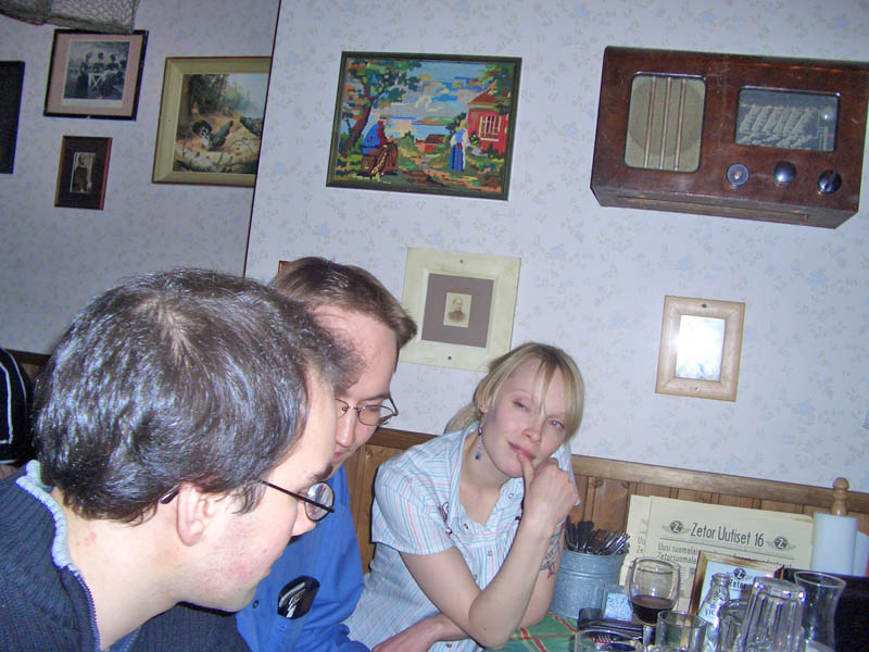 Poutsi, aplfi and imleH. Notice the nice paintings on the wall.