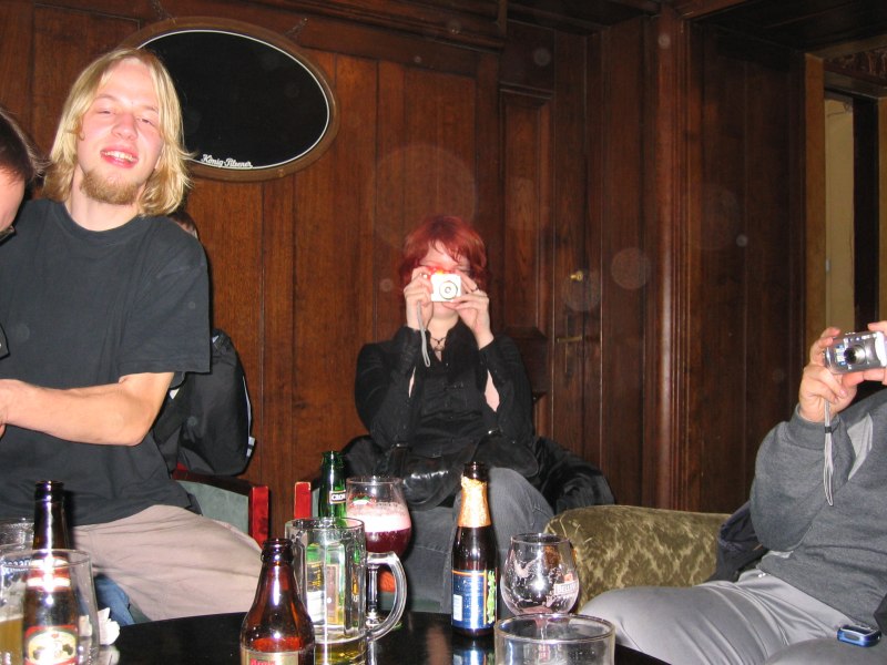 turkoosi and Prynde taking pictures of us. This bar used to be an old bank, thus the name Old Bank.