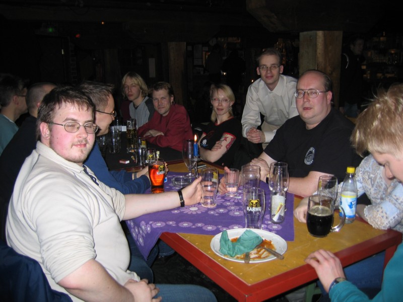 Here we are again. Osku-82 on the left with his eyes closed, on the other side of the table facing the camera are Dakkus, KimmoJ, imleH, avij (behind imleH and Mako), Mako, the hands of Henriika and the head of Aaron.