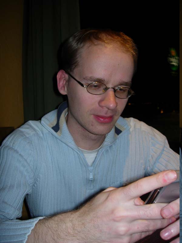 avij checking up something on his mobile.