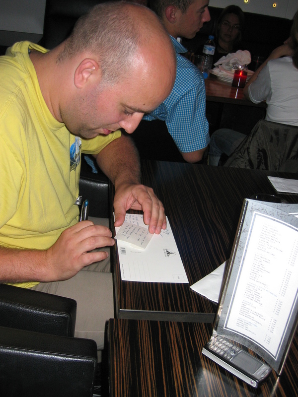 Pet26644 participating in writing a postcard to Philippe. Hope the address is correct..
