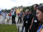Looking at the grave.