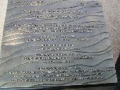 The plaquette of the bridge at the tripoint of Germany, France and Switzerland.