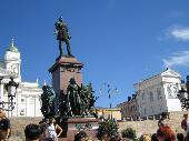 statue of Alexander II with Dakkus on the left giving explanation