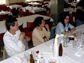 Chatting after lunch. From left to right: myxovirus, myxovirus's wife, Castanhola's wife.