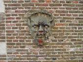 mask in the wall
