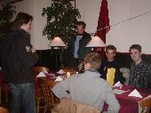 Sitting down in the restaurant.