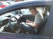 Crossmaster writing down some serials exchanged at Haid-Center