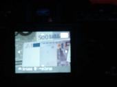 A picture of a picture of even more money