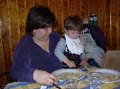 giulcenc's wife and child while they're eating 