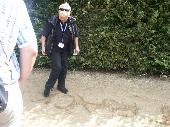 Luise. drawing eurobilltracker.com in the sand