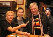 Everybody's happy. The owner (left) about us paying our bill with more than thirty Fivers