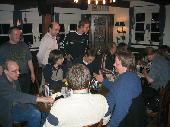 Standing: BaliBennie, HBoZ, Fons. Left at the table: Ernst, Hangman, Nivram, Mr. + Mrs. ProChrist. Right: Grob-e, wisi, Licht & Feuer, magpie