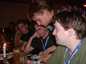 Speukes, Burky, Fons and Magpie counting money for the bill.