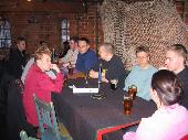 Here's a group of Finnish EuroBillTrackers: KimmoJ in his red coat, Dakkus behind him (not quite visible), then Esko (of Esko&Keaw fame), on the other side of the table are Osku-82, aplfi, Fundamental, Timo1963, sik_ and finally Cake, facing away the camera.
