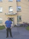 Fridaymorning. Osku^ posing in front of his apartment building.