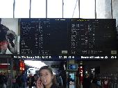 The time table at Roma Termini and a nice girl who crossed by accident while I was taking the picture :-)