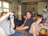 wisi taking pics, aplfi discussing with hadibe, helloggs smoking, Cake looking to another direction